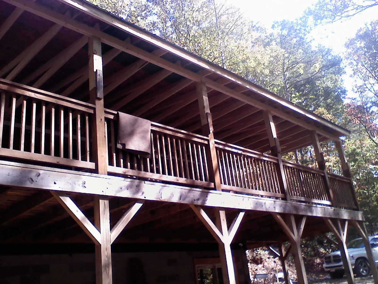 Timber framing under a new elevated porch and deck — Roof Leak Repair in Stoneham by Roofing Brothers